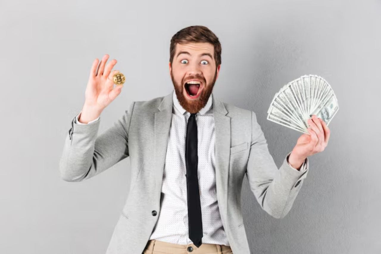 A man celebrating his success after becoming a Bitcoin millionaire
